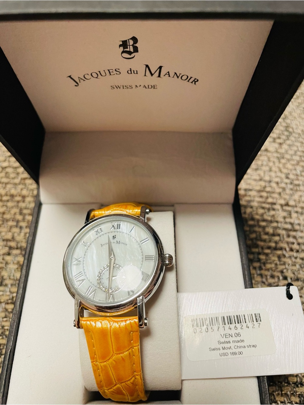 Jacques du Manoir. Swiss made. Women's Yellow Leather Strap Watch